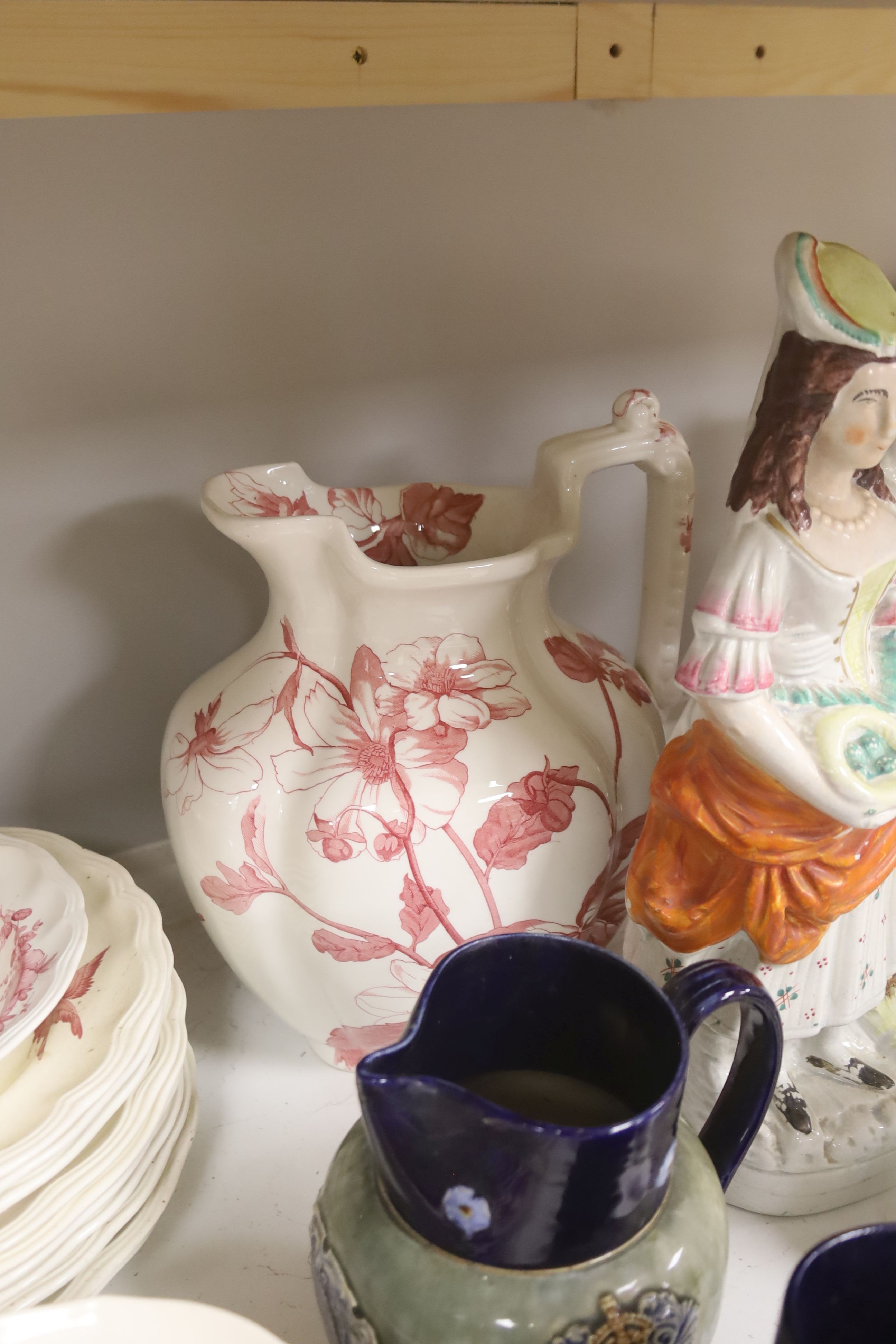 A pair of Doulton commemorative jugs, cat pail, miniature tyg and Staffordshire flatback, 40cm